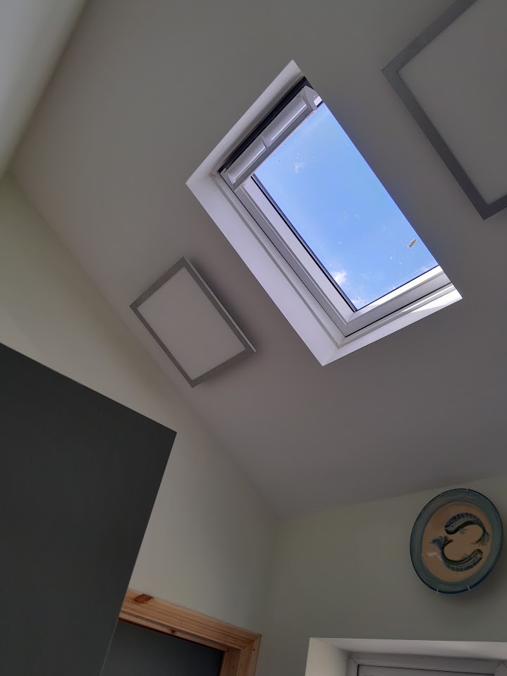 Skylight installed in a sloped bedroom ceiling by MyDeskin Carpentry, Keynsham